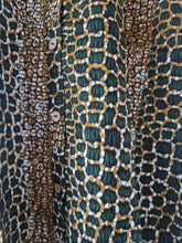 Load image into Gallery viewer, Waxprint cotton shirt. Handmade coconut buttons. Unisex fit.