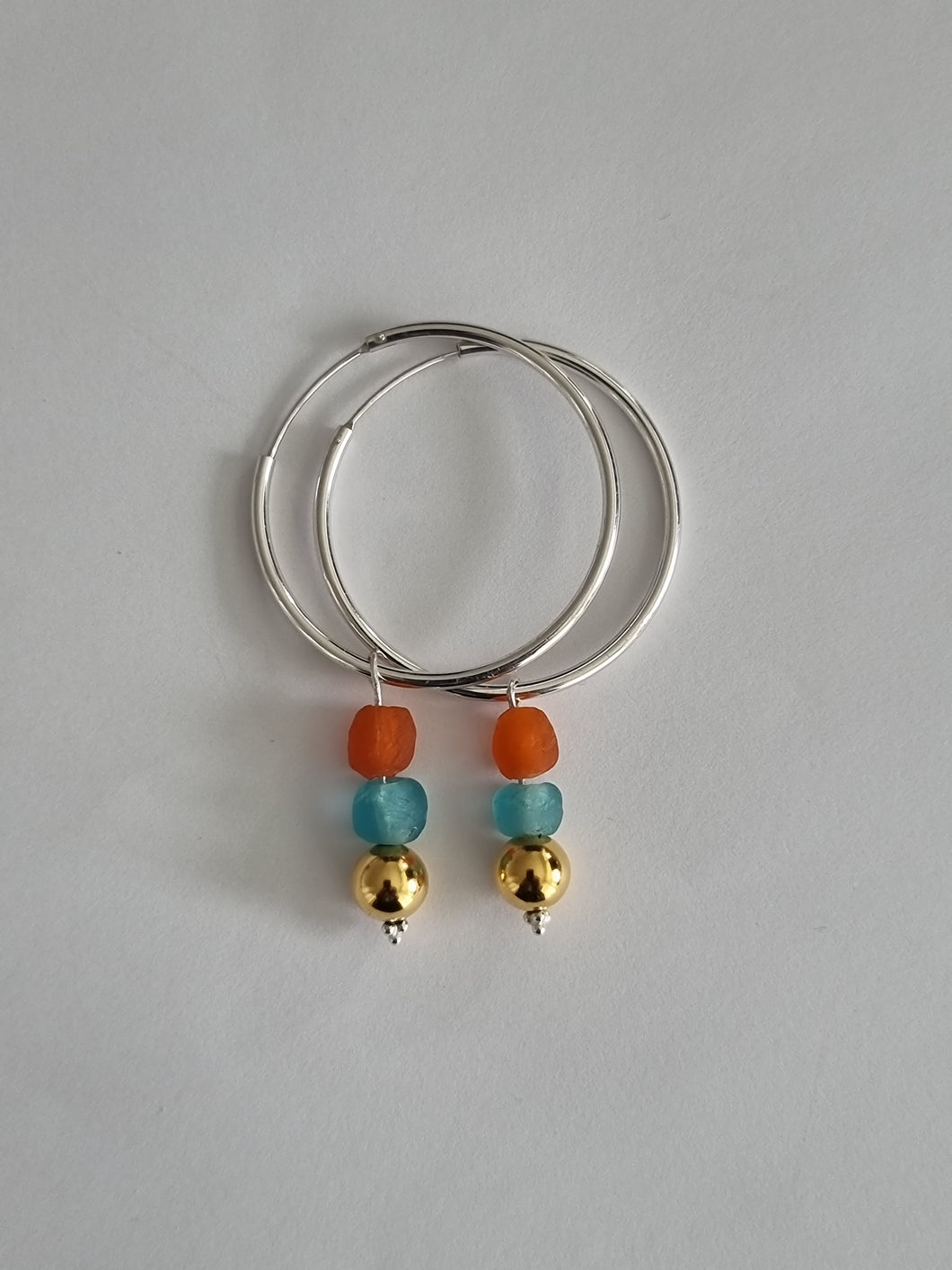 Silver earrings. Recycled glass beads from Ghana.
