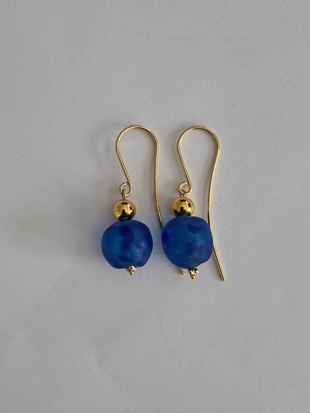 Gold plated earrings. Recycled glass beads from Ghana.