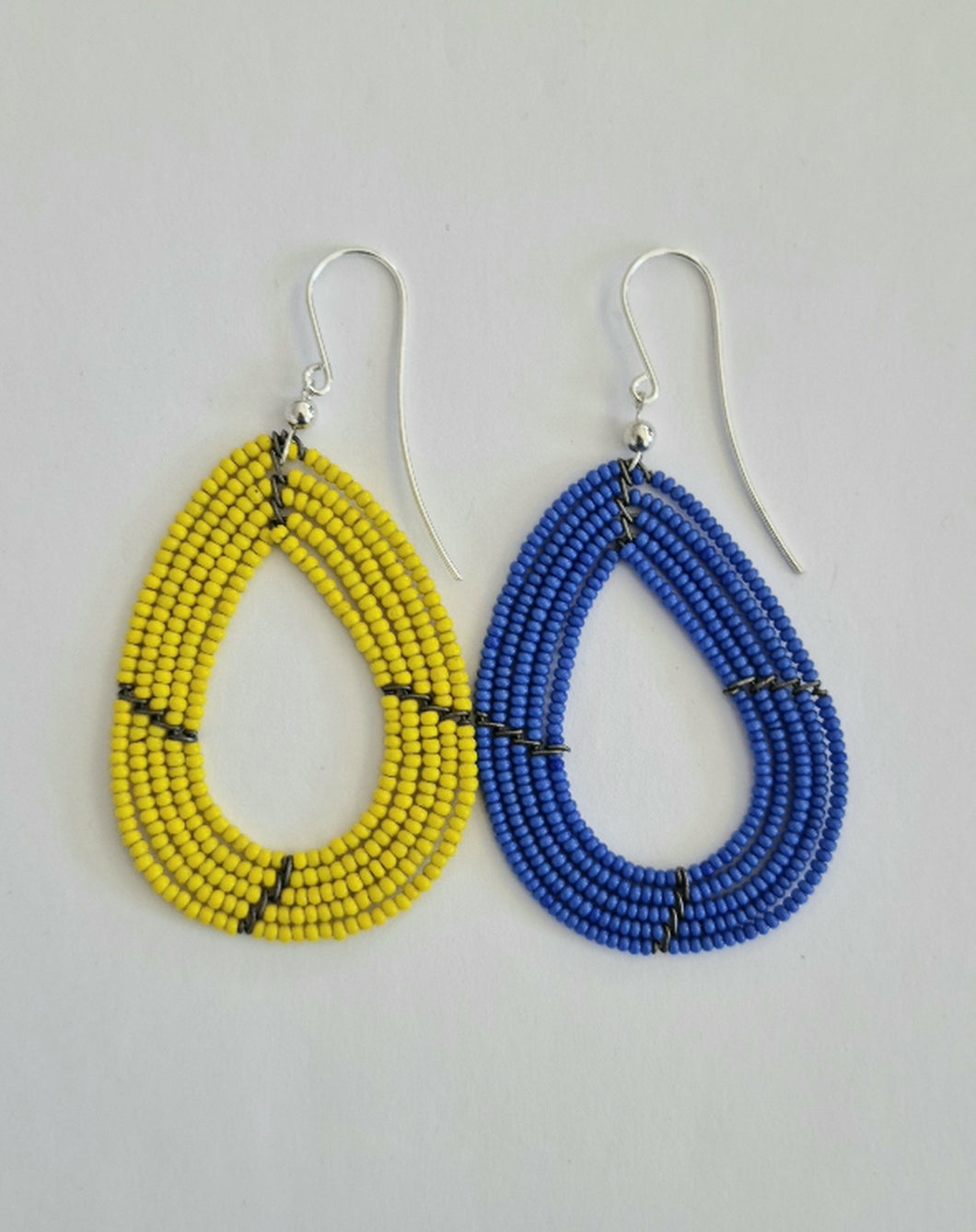 Earrings with small bead. Beadwork made in Kenya.